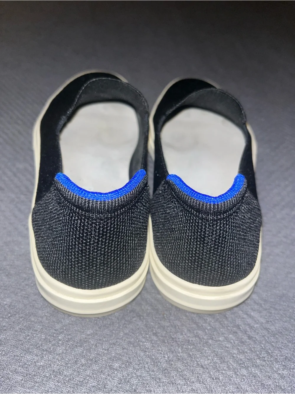 EUC Rothy's The Original Slip-On Sneakers in black. Size 9